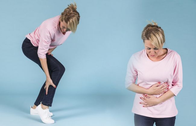mujer-dolor-piernas-dolor-abdomen